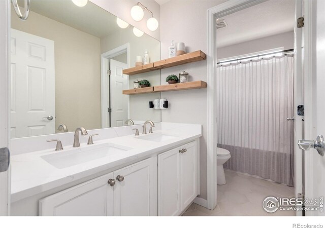3290 Discovery Ct, Broomfield, CO 80023 - full bathroom with toilet and double vanity
