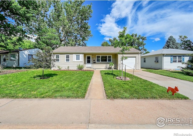 2416 15th Ave, Greeley, CO 80631 - single story home with driveway, an attached garage, and a front yard