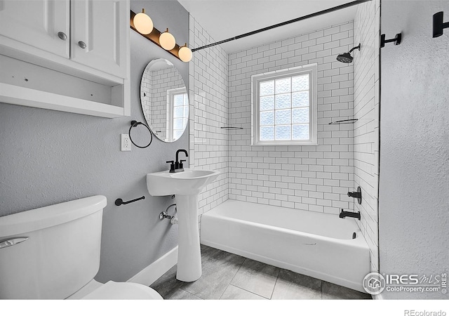 2416 15th Ave, Greeley, CO 80631 - bathroom featuring toilet and washtub / shower combination