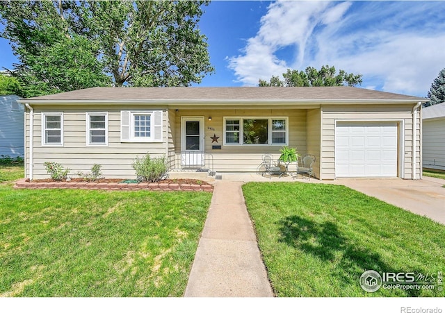 2416 15th Ave, Greeley, CO 80631 - ranch-style house with a garage, a front yard, and concrete driveway