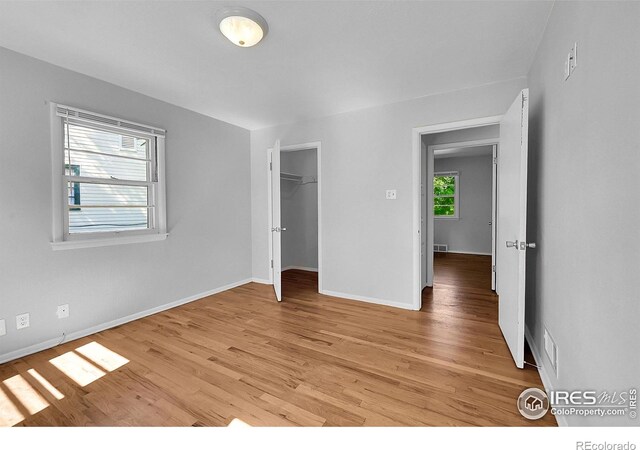 2416 15th Ave, Greeley, CO 80631 - unfurnished bedroom featuring light wood-style floors