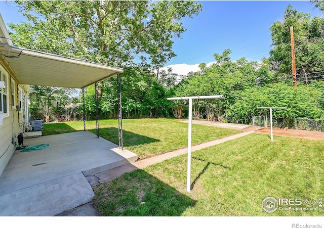 2416 15th Ave, Greeley, CO 80631 - fenced backyard featuring a patio area