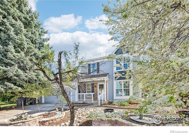 951 Vetch Cir, Lafayette, CO 80026 - traditional home with covered porch and driveway