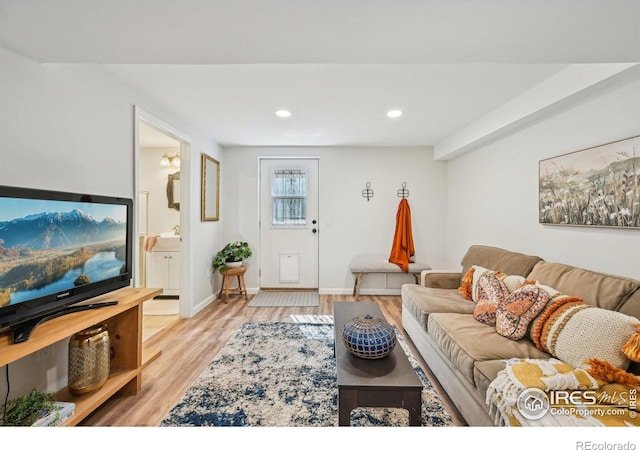 951 Vetch Cir, Lafayette, CO 80026 - living room with light wood finished floors and recessed lighting