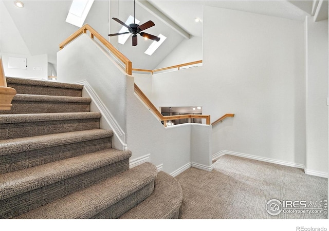 4332 Clay Commons Ct, Boulder, CO 80303 - stairway featuring a skylight, beam ceiling, carpet flooring, ceiling fan, and recessed lighting