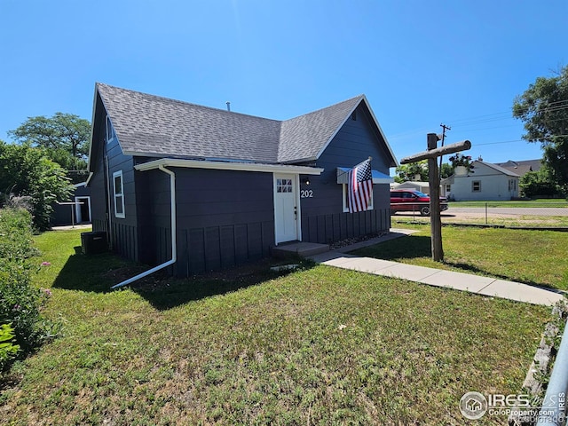 202 N 7th Ave, Sterling, CO 80751 - view of front facade with a shingled roof