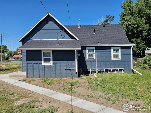 202 N 7th Ave, Sterling, CO 80751 - view of front of house featuring a shingled roof