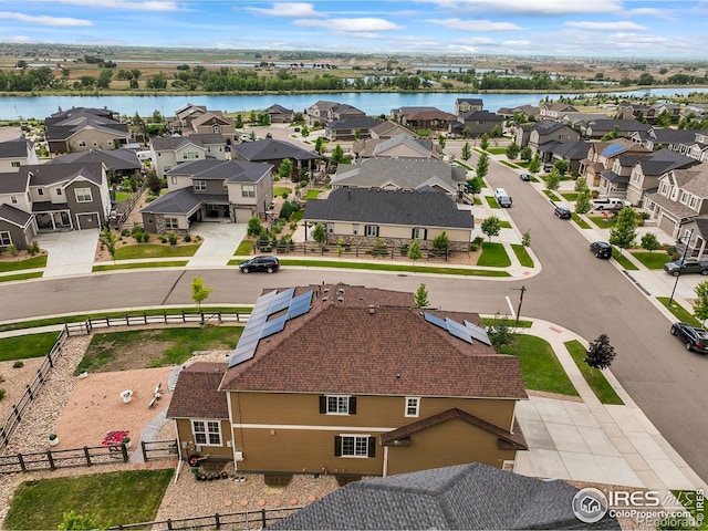 12648 Canoe St, Firestone, CO 80504 - aerial view of residential area with a nearby body of water