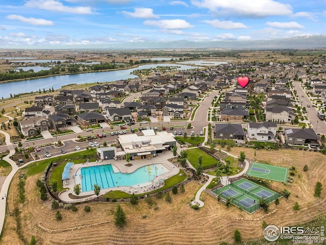 12648 Canoe St, Firestone, CO 80504 - aerial view of property's location with a nearby body of water and nearby suburban area