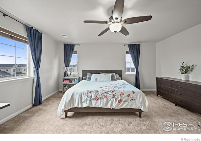 12648 Canoe St, Firestone, CO 80504 - bedroom featuring carpet floors and a ceiling fan