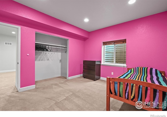 12648 Canoe St, Firestone, CO 80504 - carpeted bedroom featuring recessed lighting and a closet