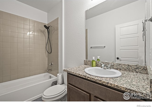 12648 Canoe St, Firestone, CO 80504 - bathroom with vanity, shower / tub combination, and a textured wall