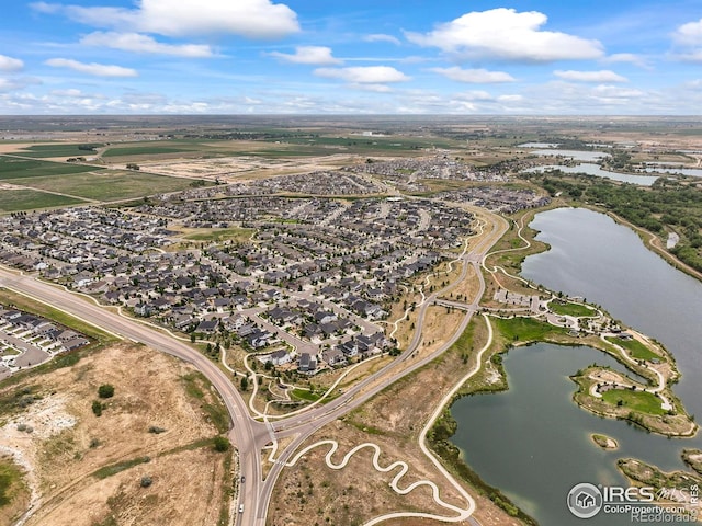 12648 Canoe St, Firestone, CO 80504 - aerial view of property's location with nearby suburban area and a large body of water