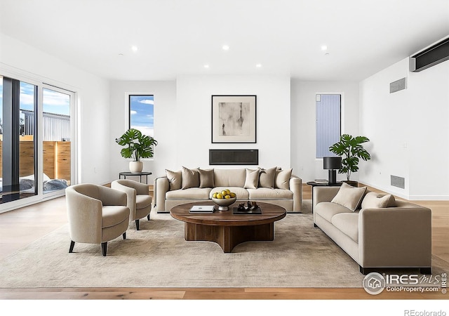 2145 Vine Ave, Boulder, CO 80304 - living area featuring wood finished floors and recessed lighting