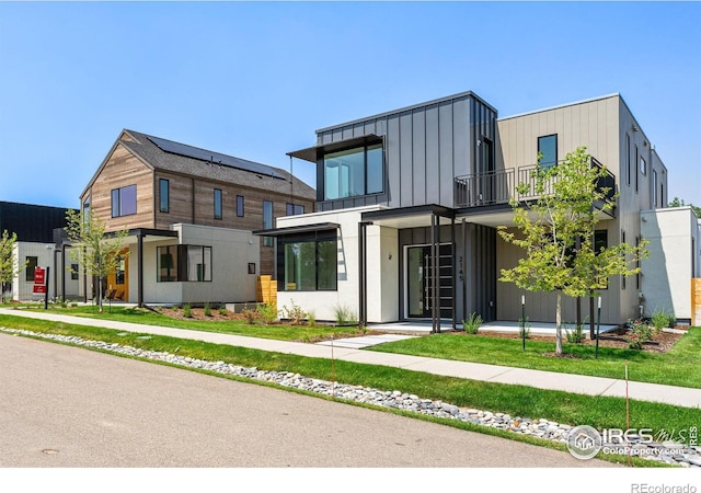 2145 Vine Ave, Boulder, CO 80304 - contemporary house featuring a balcony and board and batten siding