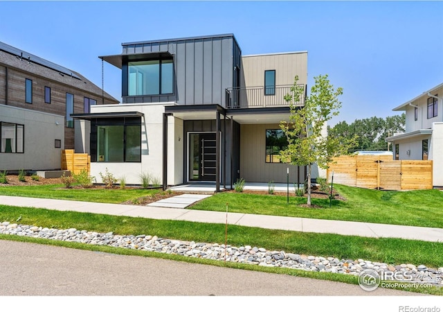2145 Vine Ave, Boulder, CO 80304 - modern home featuring a balcony and board and batten siding