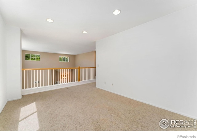 17132 E 104th Way, Commerce City, CO 80022 - carpeted spare room with recessed lighting and baseboards