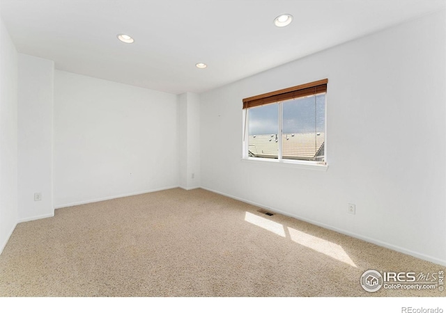 17132 E 104th Way, Commerce City, CO 80022 - empty room featuring recessed lighting and carpet floors