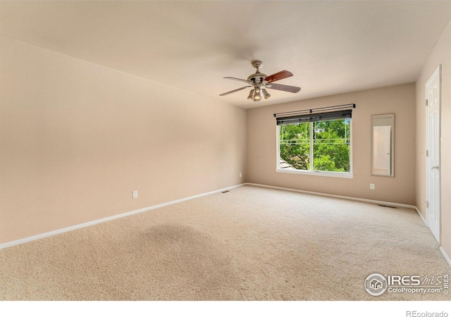 17132 E 104th Way, Commerce City, CO 80022 - carpeted spare room with baseboards and a ceiling fan