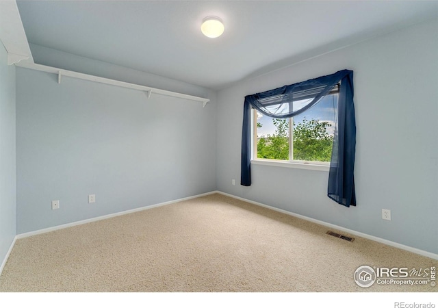 17132 E 104th Way, Commerce City, CO 80022 - carpeted empty room with baseboards