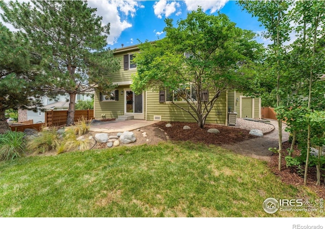 17132 E 104th Way, Commerce City, CO 80022 - rear view of house featuring a patio area
