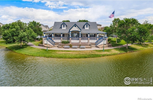 17132 E 104th Way, Commerce City, CO 80022 - rear view of property with a water view and a lawn