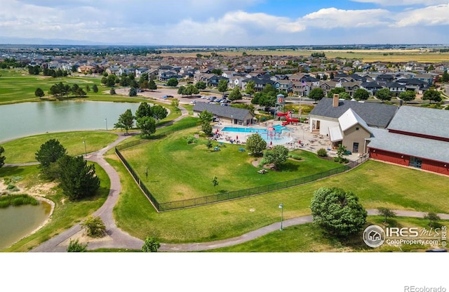 17132 E 104th Way, Commerce City, CO 80022 - aerial perspective of suburban area featuring a nearby body of water and a pool