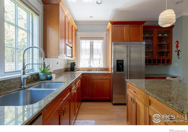 901 Terrace Cir S, Boulder, CO 80304 - kitchen featuring high end fridge, plenty of natural light, stone countertops, and recessed lighting
