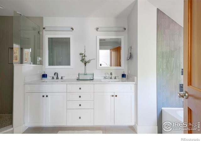901 Terrace Cir S, Boulder, CO 80304 - full bath with double vanity, a shower, tile patterned flooring, and a tub to relax in