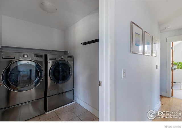 901 Terrace Cir S, Boulder, CO 80304 - laundry area featuring washer and dryer and baseboards