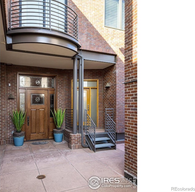 820 Pearl St, Boulder, CO 80302 - entrance to property with a balcony and brick siding