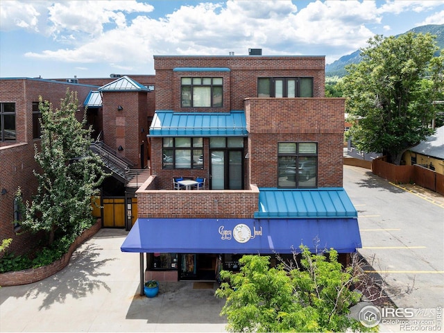 820 Pearl St, Boulder, CO 80302 - view of building exterior with a mountain view