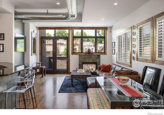 820 Pearl St, Boulder, CO 80302 - living room featuring wood finished floors, recessed lighting, and a tile fireplace