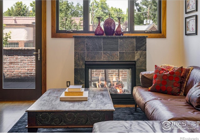 820 Pearl St, Boulder, CO 80302 - living area with wood finished floors and a tile fireplace