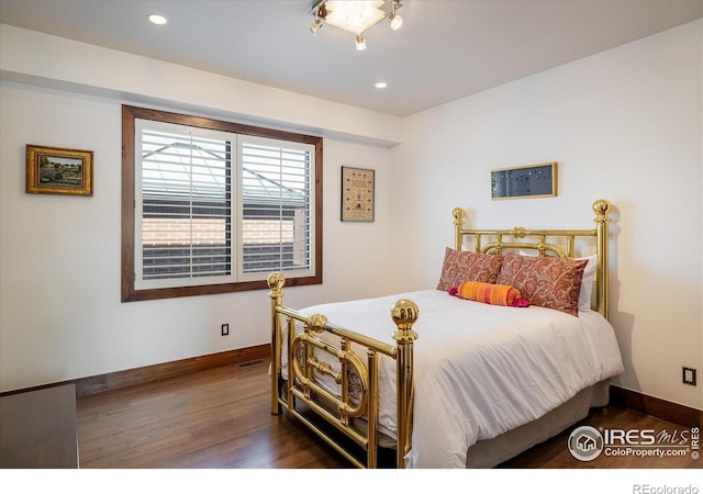 820 Pearl St, Boulder, CO 80302 - bedroom with wood finished floors and recessed lighting