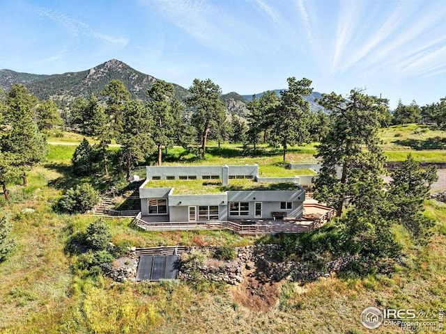 3884 Douglas Mountain Dr, Golden, CO 80403 - rear view of house with a deck with mountain view