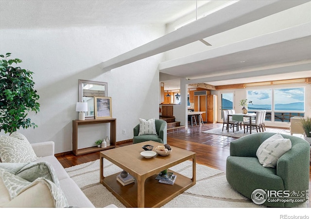 3884 Douglas Mountain Dr, Golden, CO 80403 - living area with wood finished floors and a high ceiling