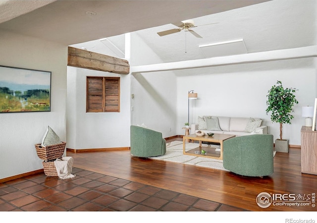 3884 Douglas Mountain Dr, Golden, CO 80403 - living room featuring vaulted ceiling, wood finished floors, and attic access