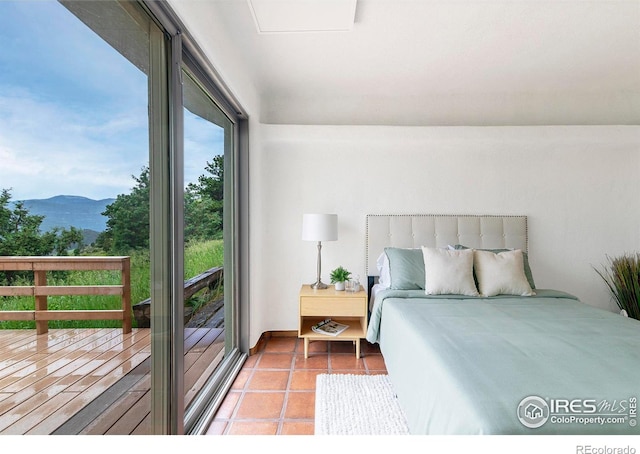 3884 Douglas Mountain Dr, Golden, CO 80403 - tiled bedroom featuring a mountain view