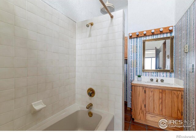 3884 Douglas Mountain Dr, Golden, CO 80403 - bathroom featuring shower / bath combination with curtain, vanity, wallpapered walls, and a textured ceiling