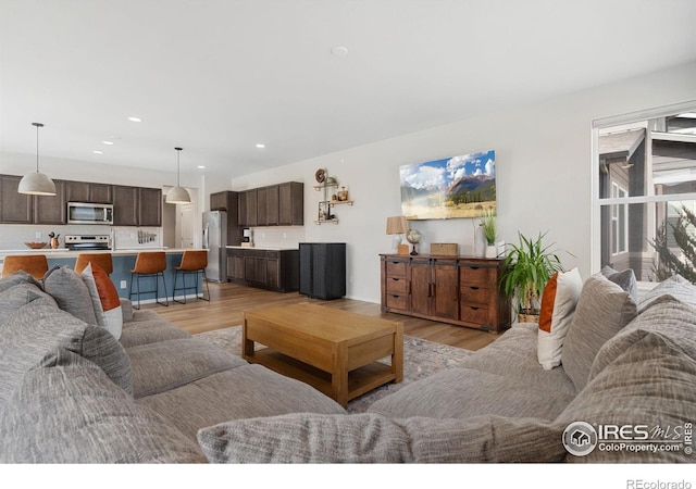 5199 Beckworth St, Timnath, CO 80547 - living area with light wood-type flooring and recessed lighting