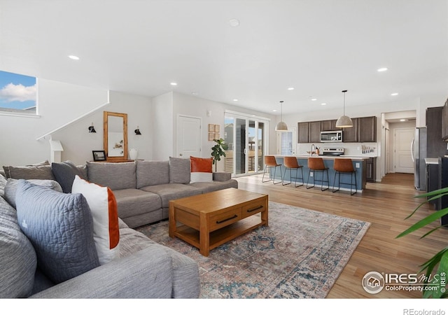 5199 Beckworth St, Timnath, CO 80547 - living area with recessed lighting and light wood-style flooring