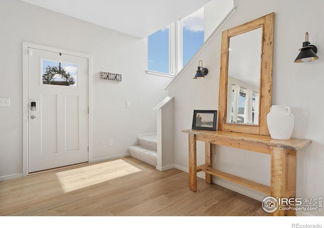 5199 Beckworth St, Timnath, CO 80547 - entrance foyer with stairway and wood finished floors