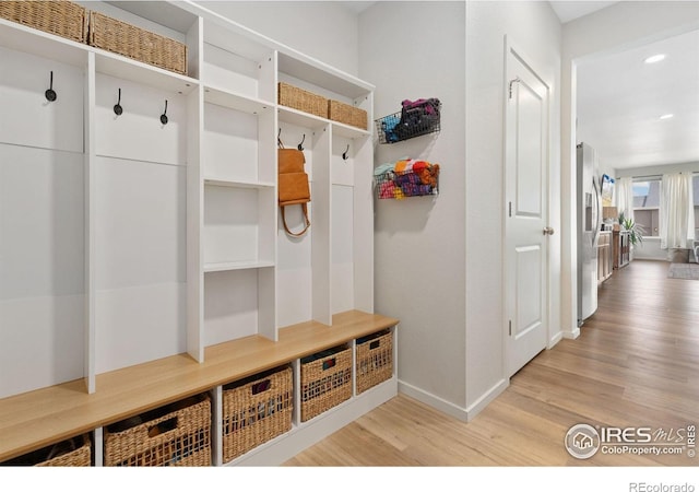 5199 Beckworth St, Timnath, CO 80547 - mudroom with wood finished floors and recessed lighting