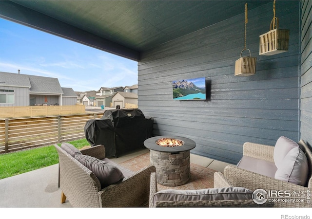 5199 Beckworth St, Timnath, CO 80547 - view of patio featuring a grill, an outdoor fire pit, and a residential view