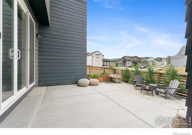 5199 Beckworth St, Timnath, CO 80547 - view of patio / terrace featuring a fire pit and a residential view