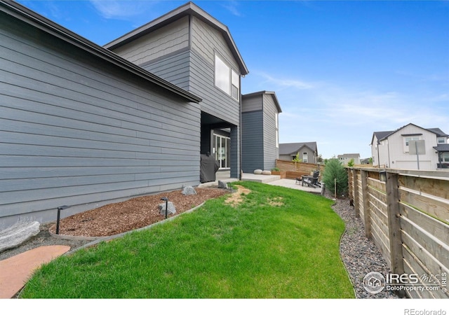 5199 Beckworth St, Timnath, CO 80547 - fenced backyard featuring a patio area and outdoor lounge area
