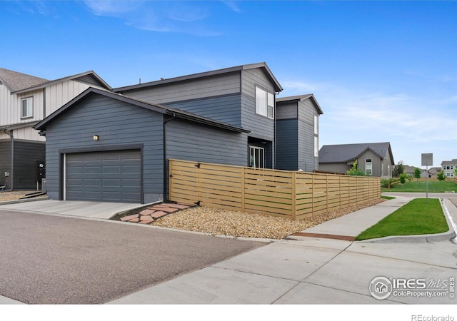 5199 Beckworth St, Timnath, CO 80547 - modern home with an attached garage and driveway