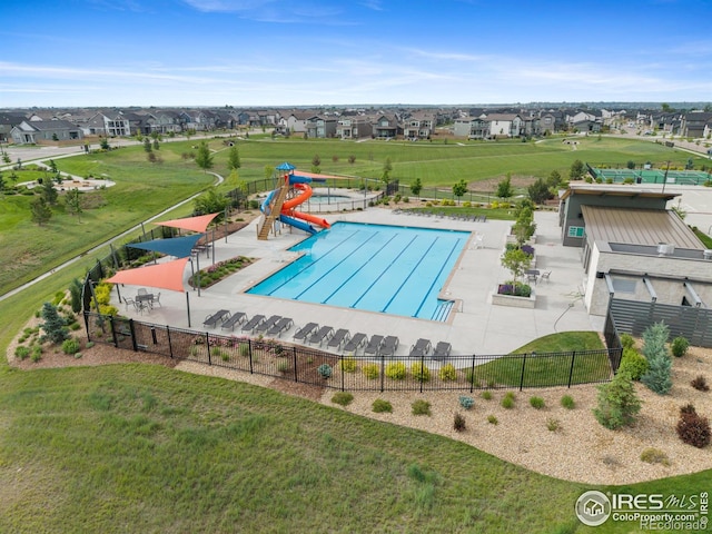 5199 Beckworth St, Timnath, CO 80547 - community pool featuring a water slide and a residential view