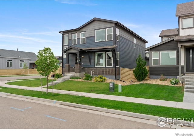 5199 Beckworth St, Timnath, CO 80547 - view of front of home with brick siding